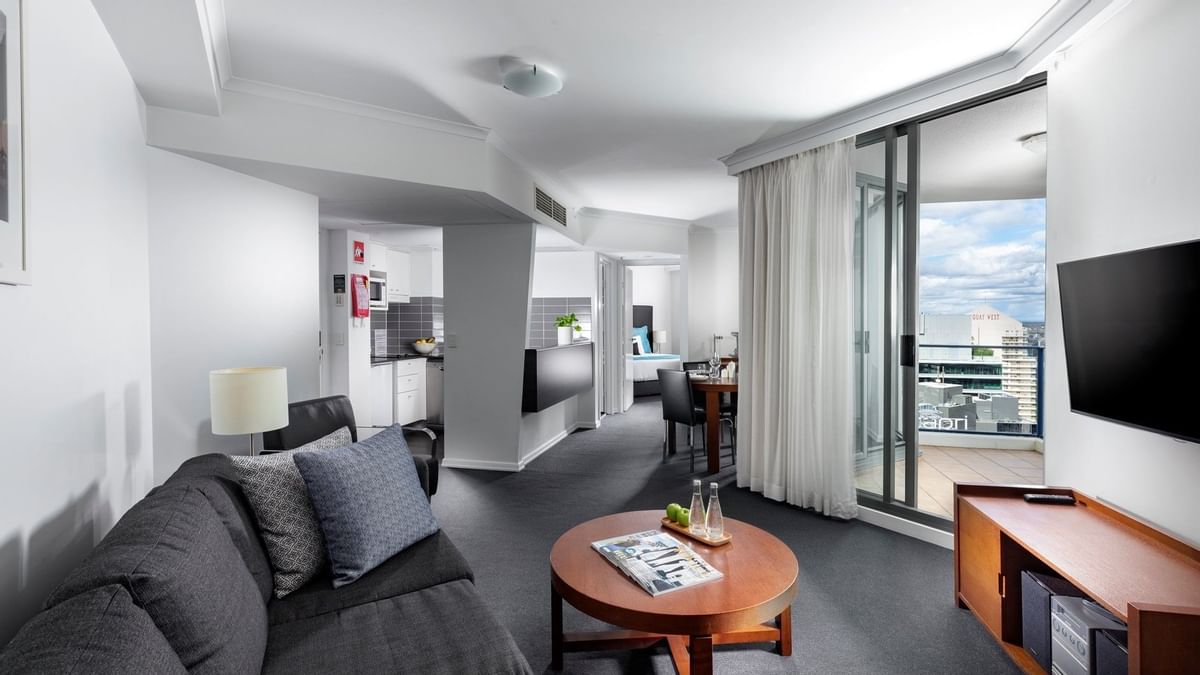 Premium one bedroom living room with out door view at Sebel Suites Brisbane