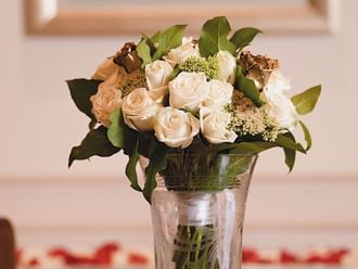 Close-up of a flower vas with roses at Palazzo Versace Dubai