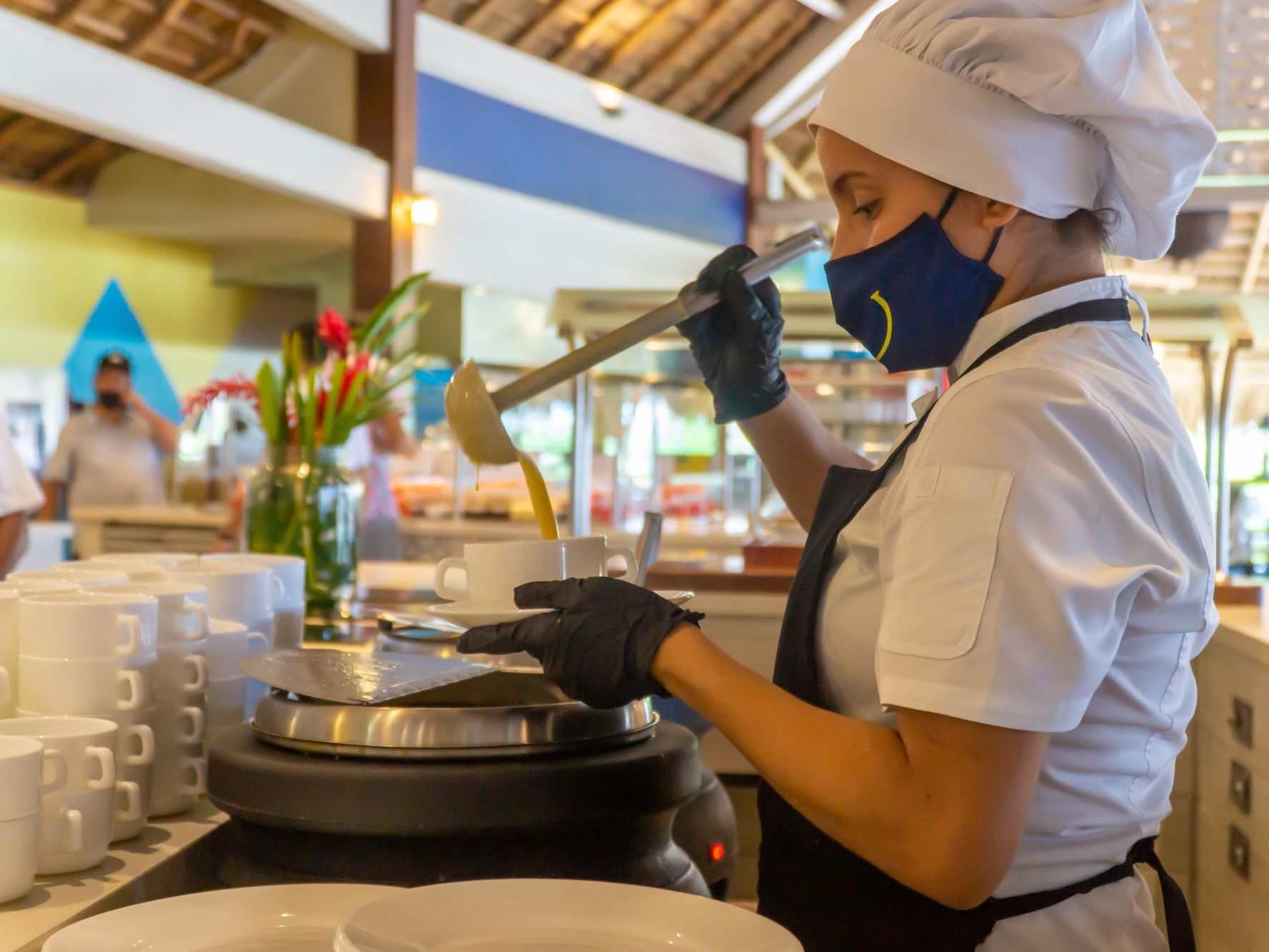 Closeup on a female chef at Calypso Restaurant in Fiesta Resort