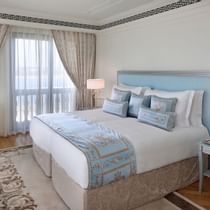 TV & king bed in Bedroom residence at Palazzo Versace Dubai
