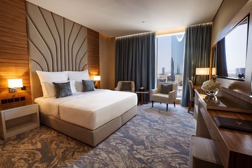 Spacious Executive Suite with a TV at Cantonal Hotel by Warwick Riyadh