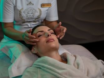 Women having a facial in the spa at Palazzo Versace Dubai