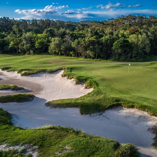 Aerial view of golf course near Pullman Magenta Shores Resort