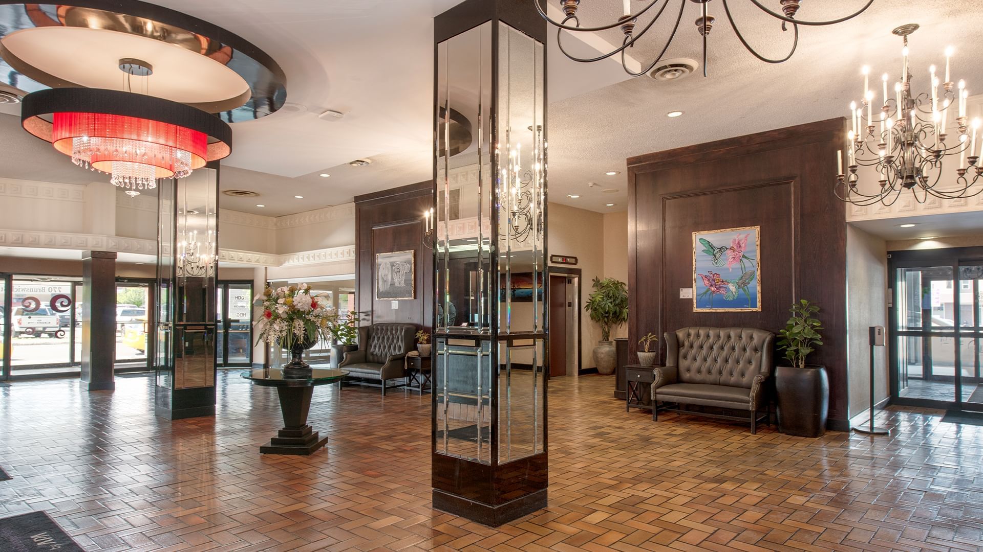 Elegant Coast Prince George Hotel by APA lobby with chandeliers