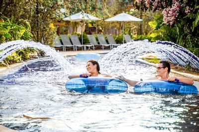 Couple Relaxing in Lazy River at The Watermill