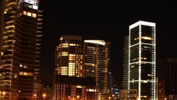 Zaitunay Bay by a city street under a night sky near Warwick Stone 55 - Beirut