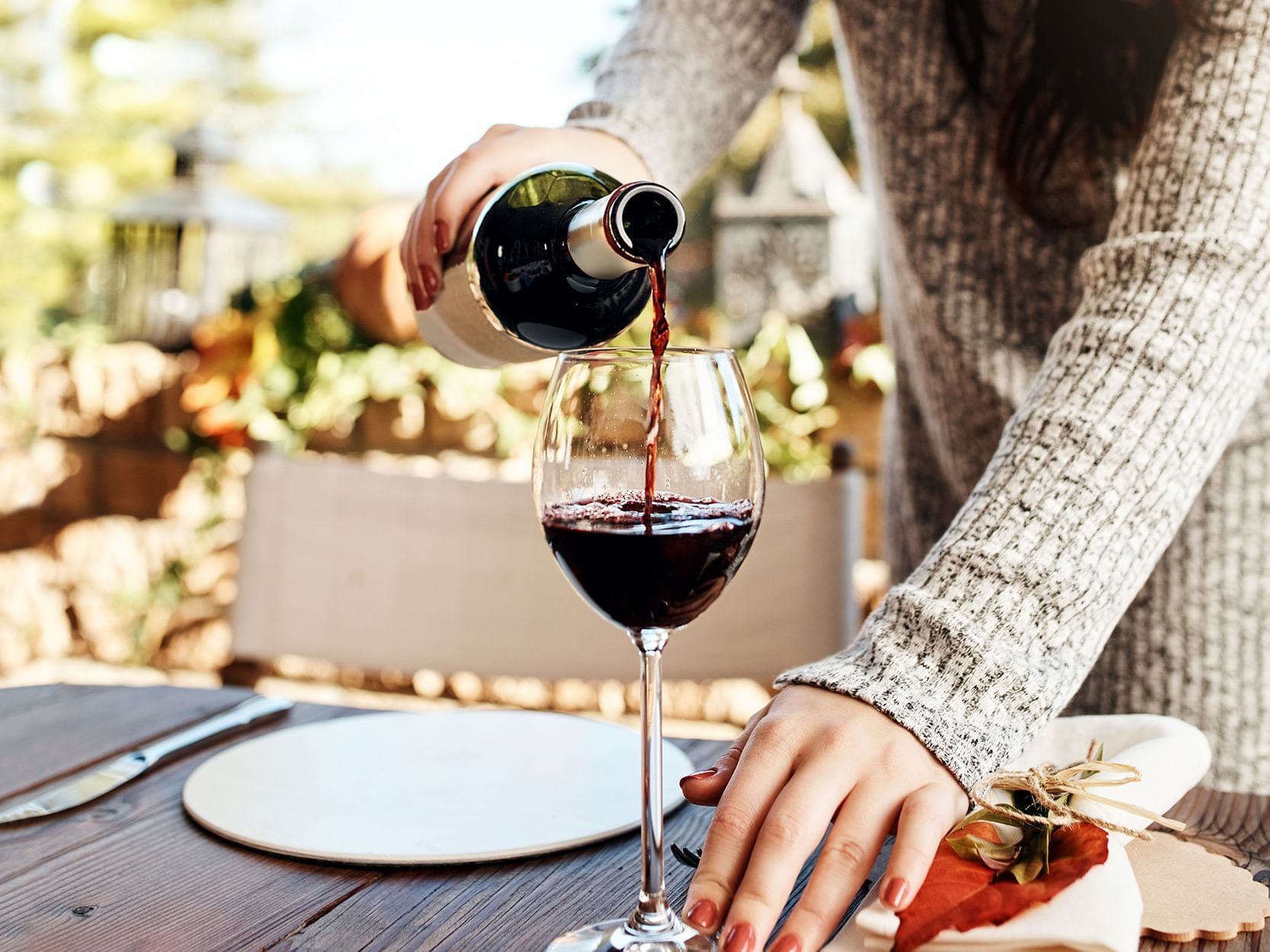 pouring wine into a wine glass