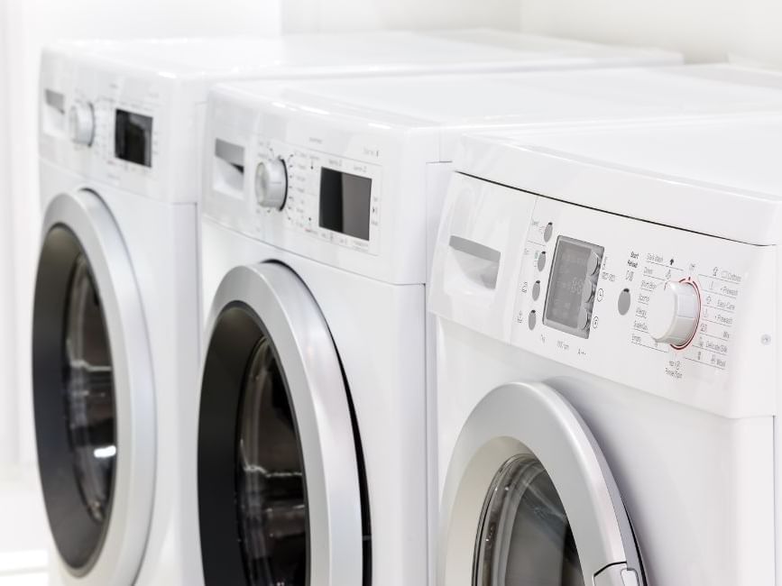 Washing machines lined up at Brady Apartment Hotel Flinders Street