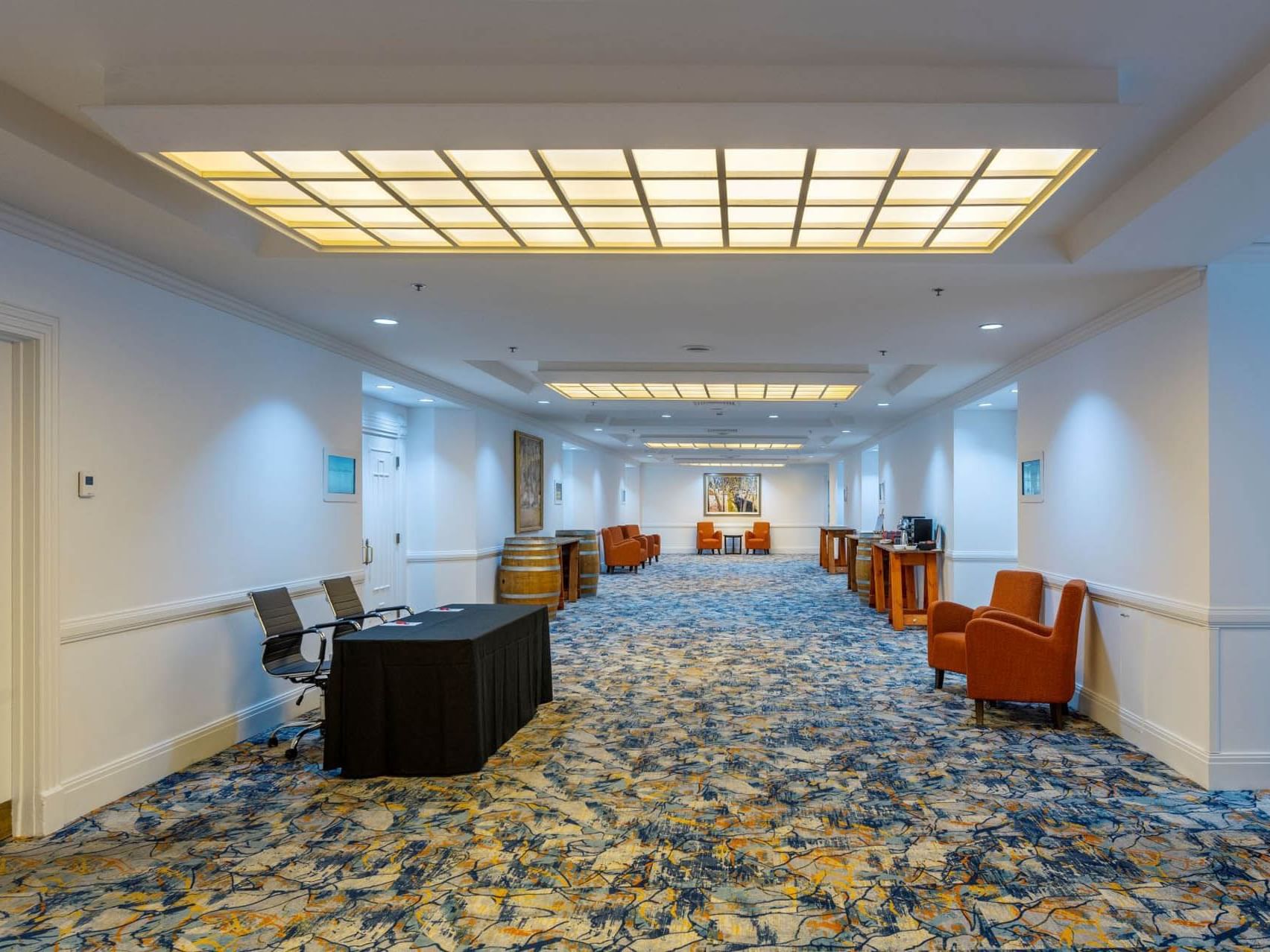 Registration table & lounge area in the lobby at Grand Chancellor Adelaide