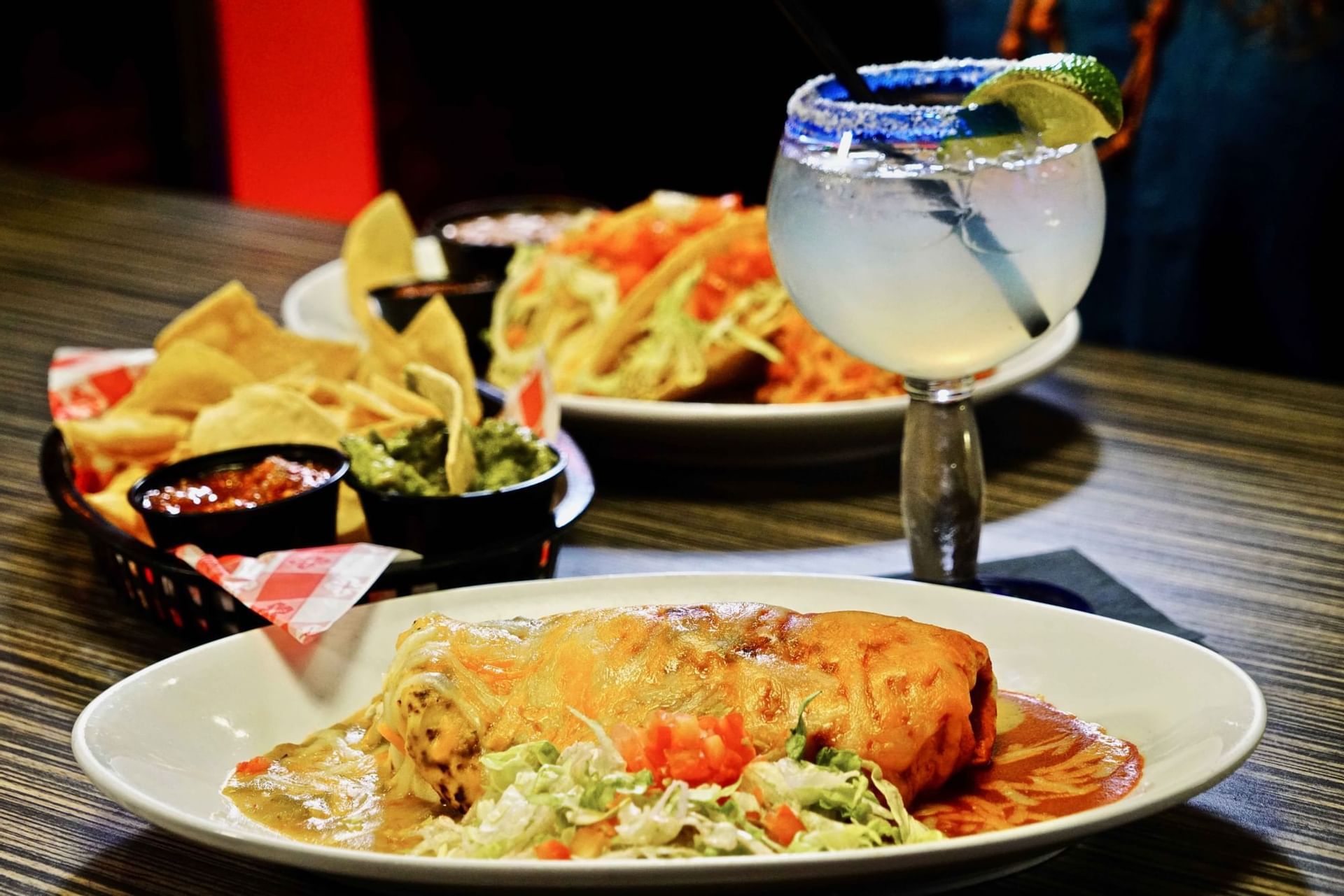 Closeup of served dishes with a Cocktail at Santa Claran Hotel