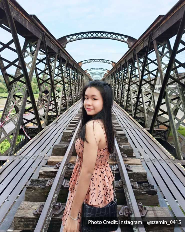 A young lady was taking a picture on the Ipoh Victoria Bridge - Lexis Suites Penang 