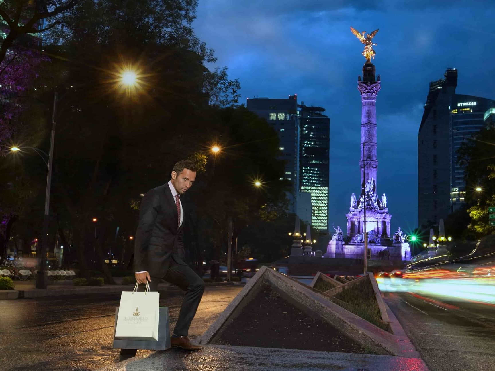 A man walking down the street at Marquis Reforma