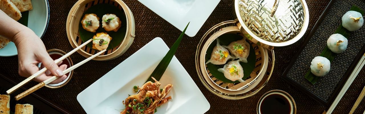 Using chopsticks in Man Tong Kitchen at Crown Hotel Melbourne