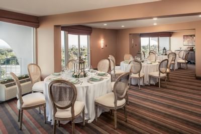 Arranged tables in Melrose & Highland Room at Hotel Angeleno