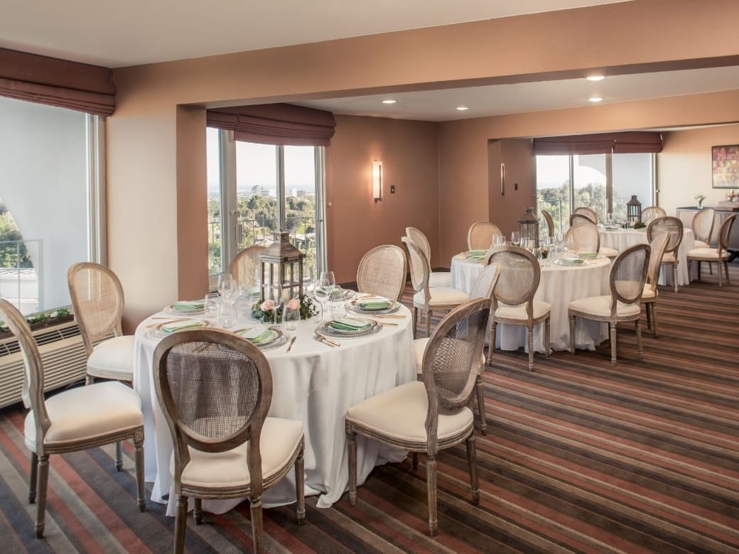 Arranged tables in Melrose & Highland Room at Hotel Angeleno