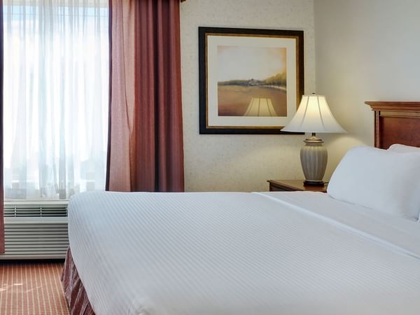 Grimshaw hotel room with king bed