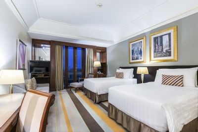 Twin beds in Premier Deluxe Room at Chatrium Hotel Royal Lake