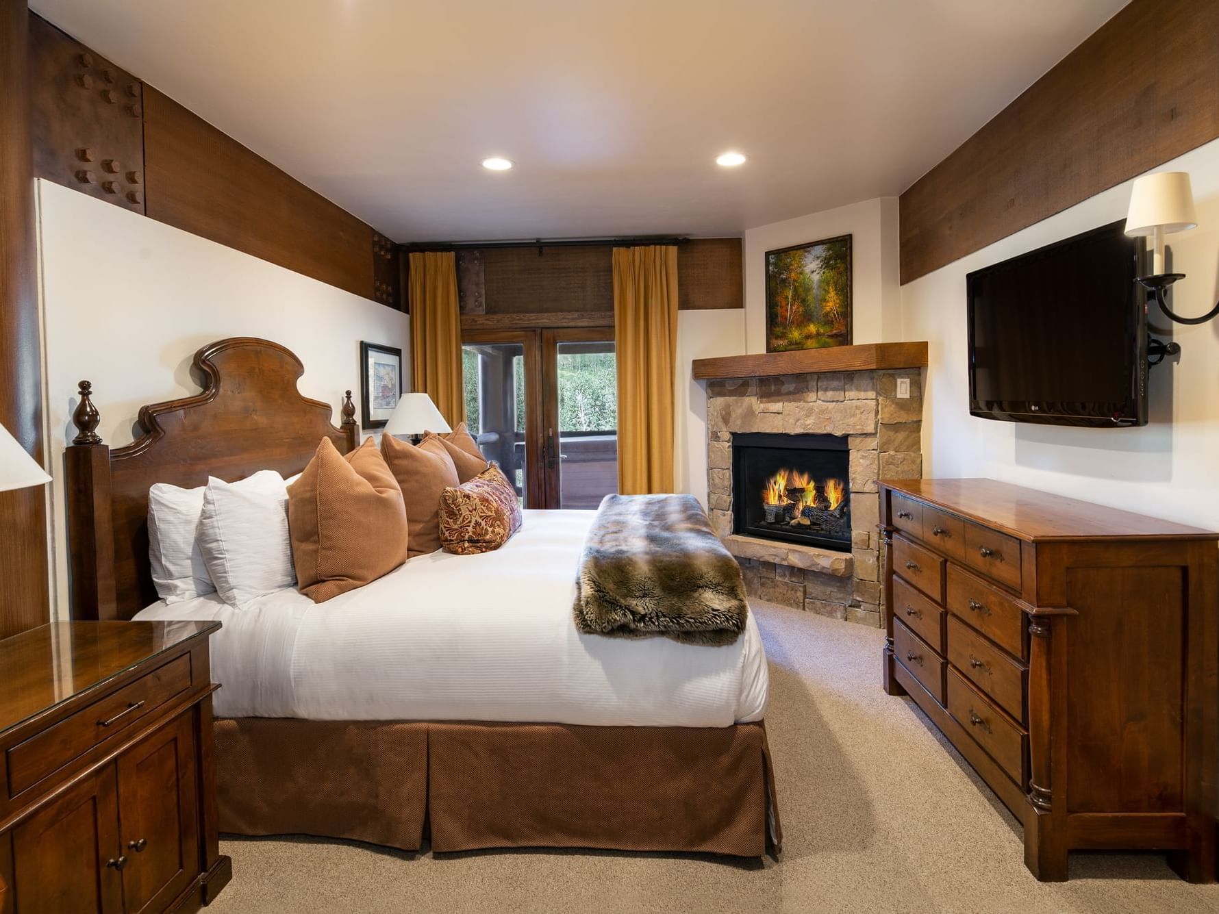 Luxury bedroom with a king bed at Stein Eriksen Lodge