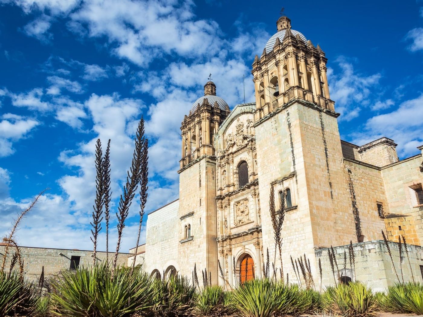 Low-angle view of Church of Santo Domingo near Fiesta Americana Hotels