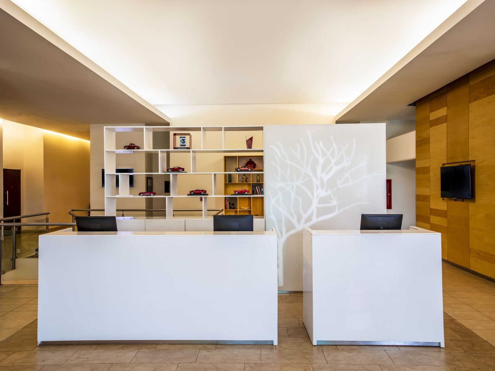 Closeup of the front desk in the lobby at Fiesta Inn Hotels