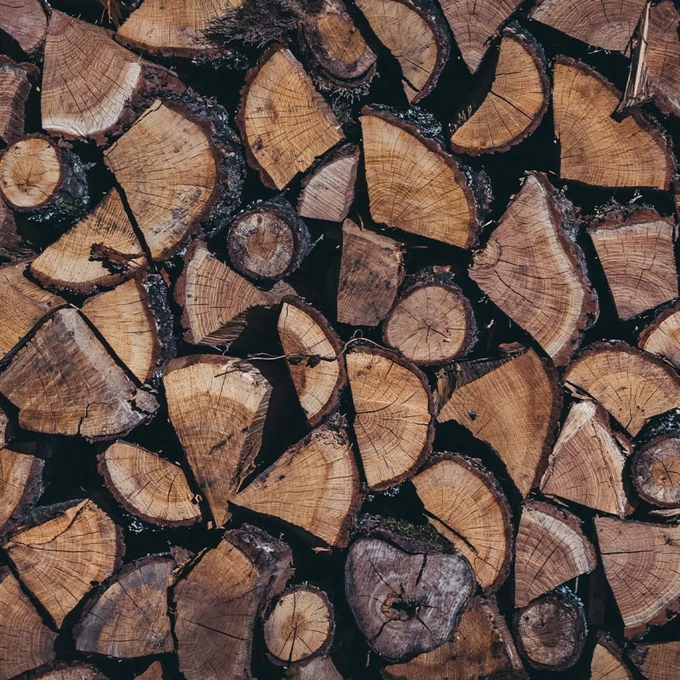 Close-up of firewood stacks at Falkensteiner Hotels