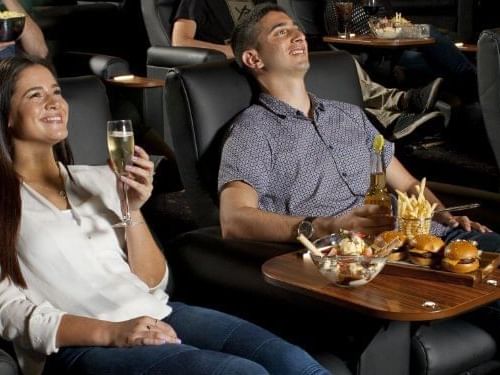 Couple watching movie in theatre near Pullman & Mercure Brisbane King George Square