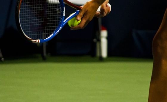 Close-up of a tennis player in motion near Richmond Hill Hotel