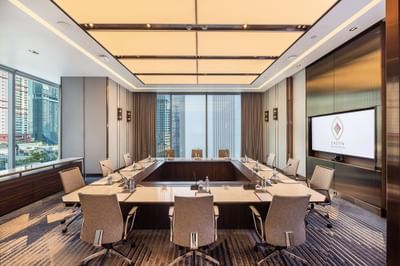 Boardroom set-up with TV in a function room at Eastin Grand Hotel Phayathai