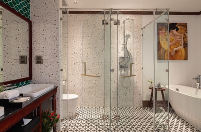 Shower and vanity area and bathtub in Studio Suite Pondside View at U Luang Prabang