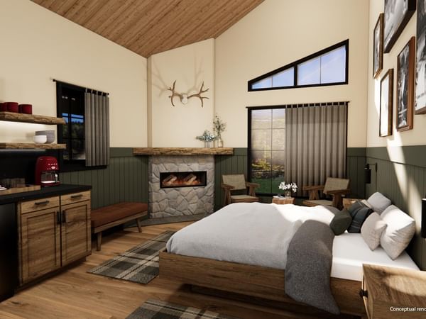 Cabin with bed, fireplace, and kitchenette
