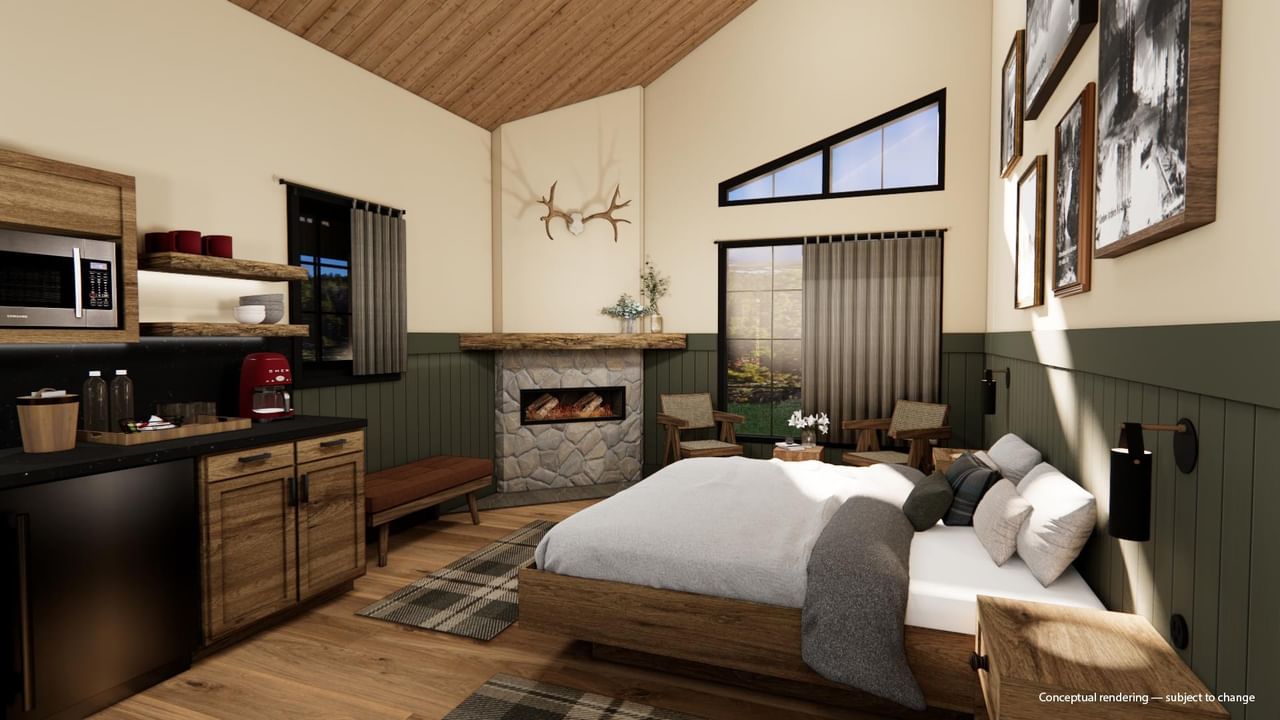 Cabin with bed, fireplace, and kitchenette