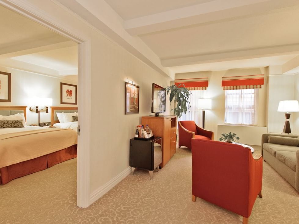 Hotel suite with bedroom and living room