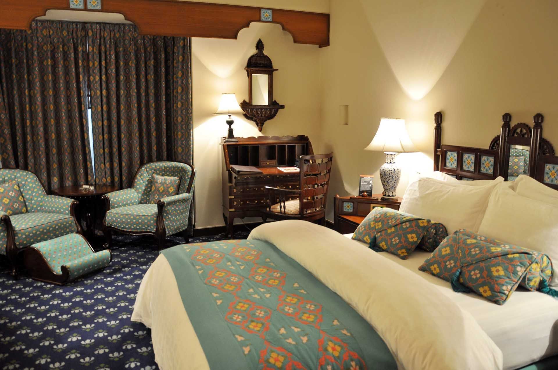 Queen bed in The Deluxe Room at Faisalabad Serena Hotel