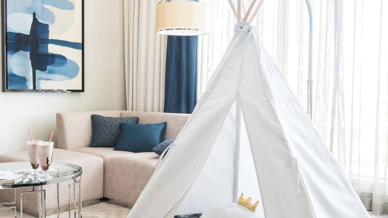 A teepee tent in a living room at Crown Hotels