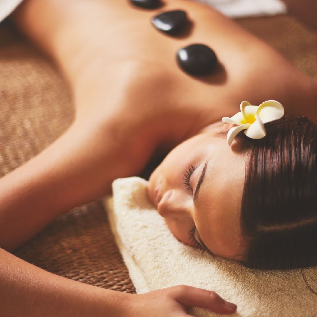 Hot Stone massage done in Balance Spa at White Mountain Hotel