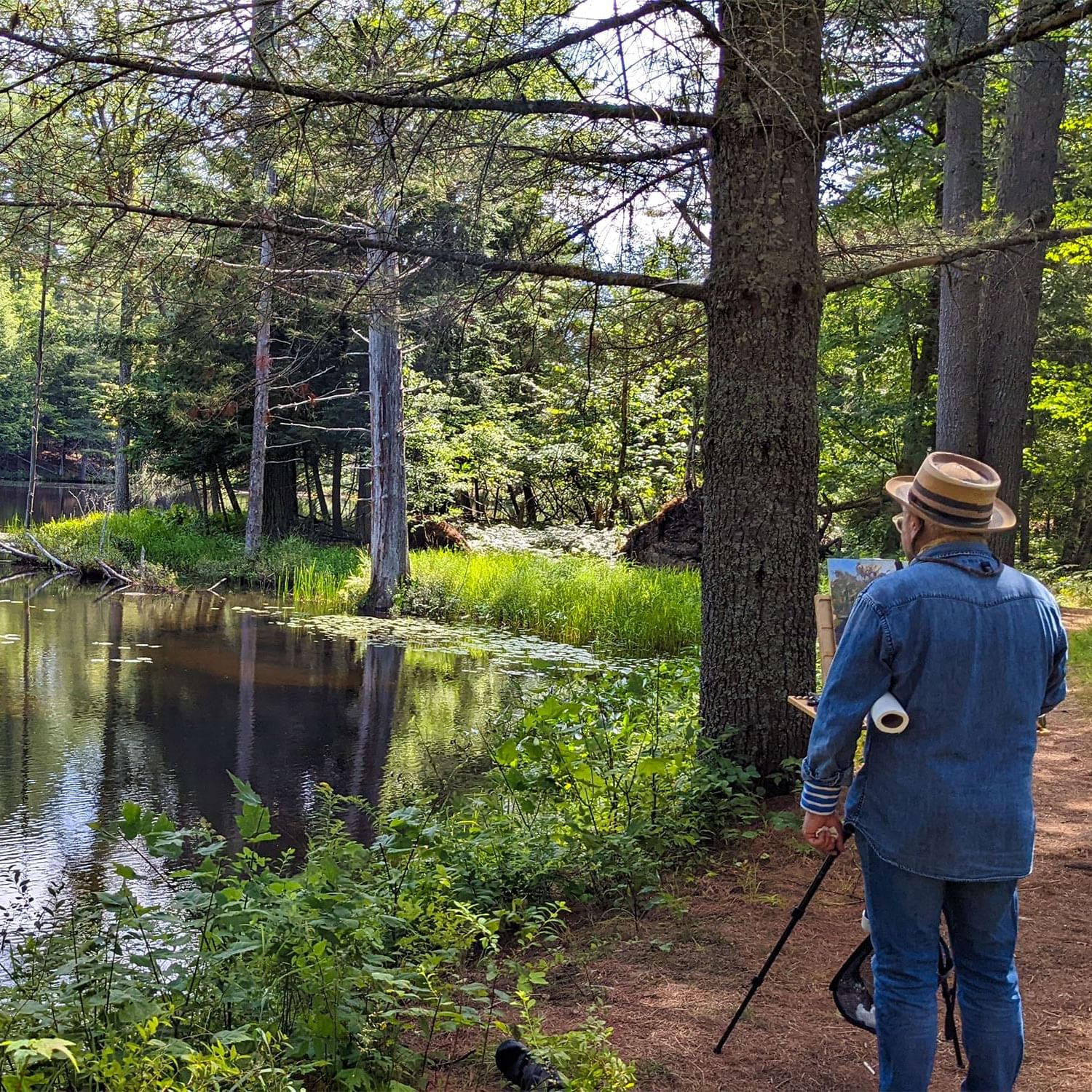 A man researching around the lake near High Peaks Resort