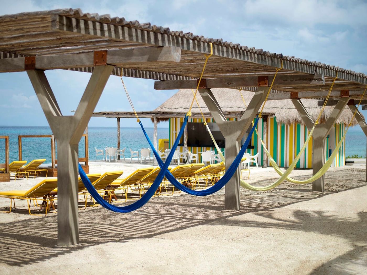 Sun beds with sea view in Beach club at The Explorean Cozumel