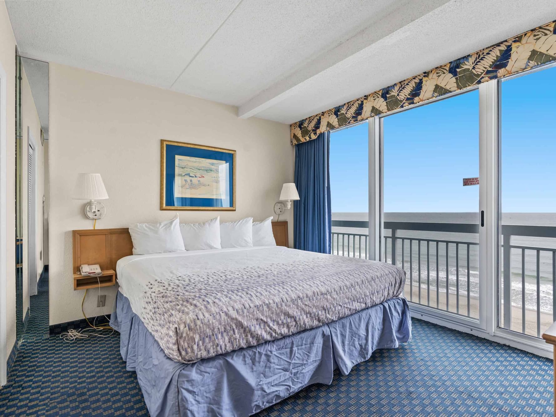 Cozy bed with sea view in Deluxe One Bedroom at The Yachtsman Resort