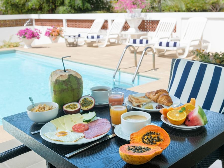 A warm breakfast served by the pool at Hotel Belova