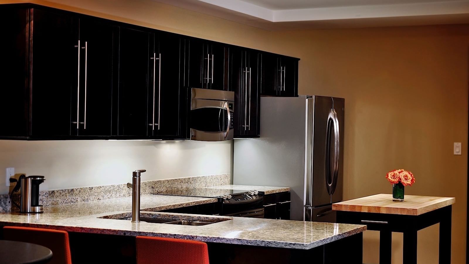 Kitchen with appliances in Mayo Suite at The Mayo Hotel