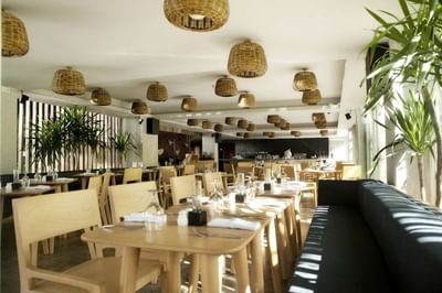 Dining area with decorated ceiling light at U NIMMAN CHIANG MAI