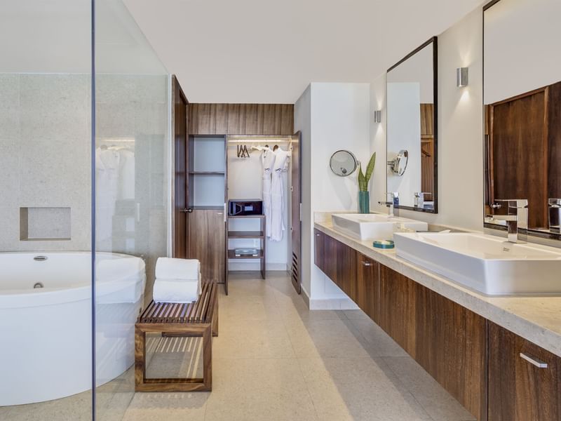 Bathroom vanity & tub in Family Suite at FA Hotels & Resorts