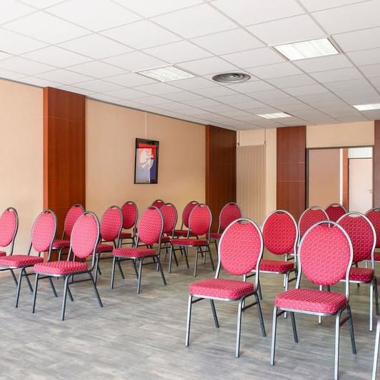 Chair arrangements of a meeting room at Originals Hotels