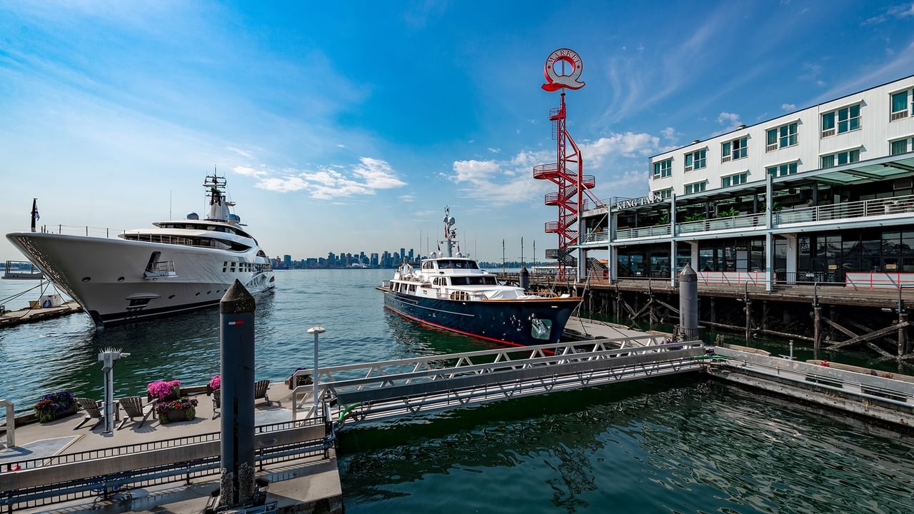 Two boats at the Quay beside the hotel