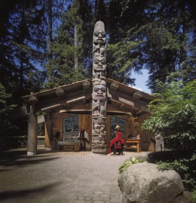 Building with large wooden statue