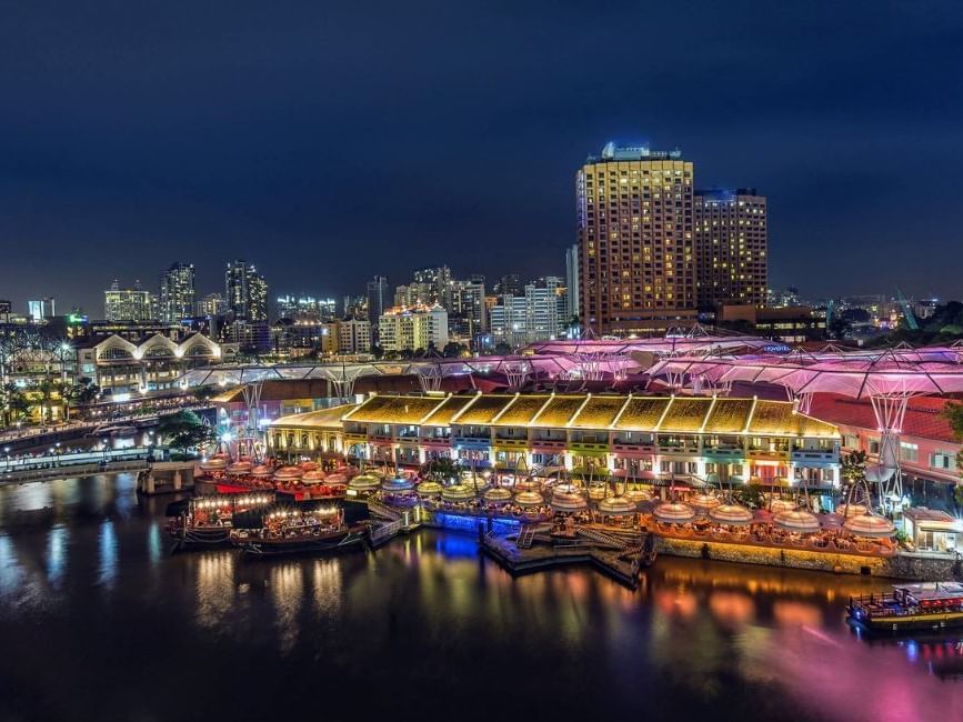 Aerial view of Clarke Quay Mall & city at night near Nostalgia Hotel Singapore