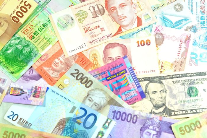 Variety of bills featuring Currency Exchange at The Banjaran Hotsprings Retreat