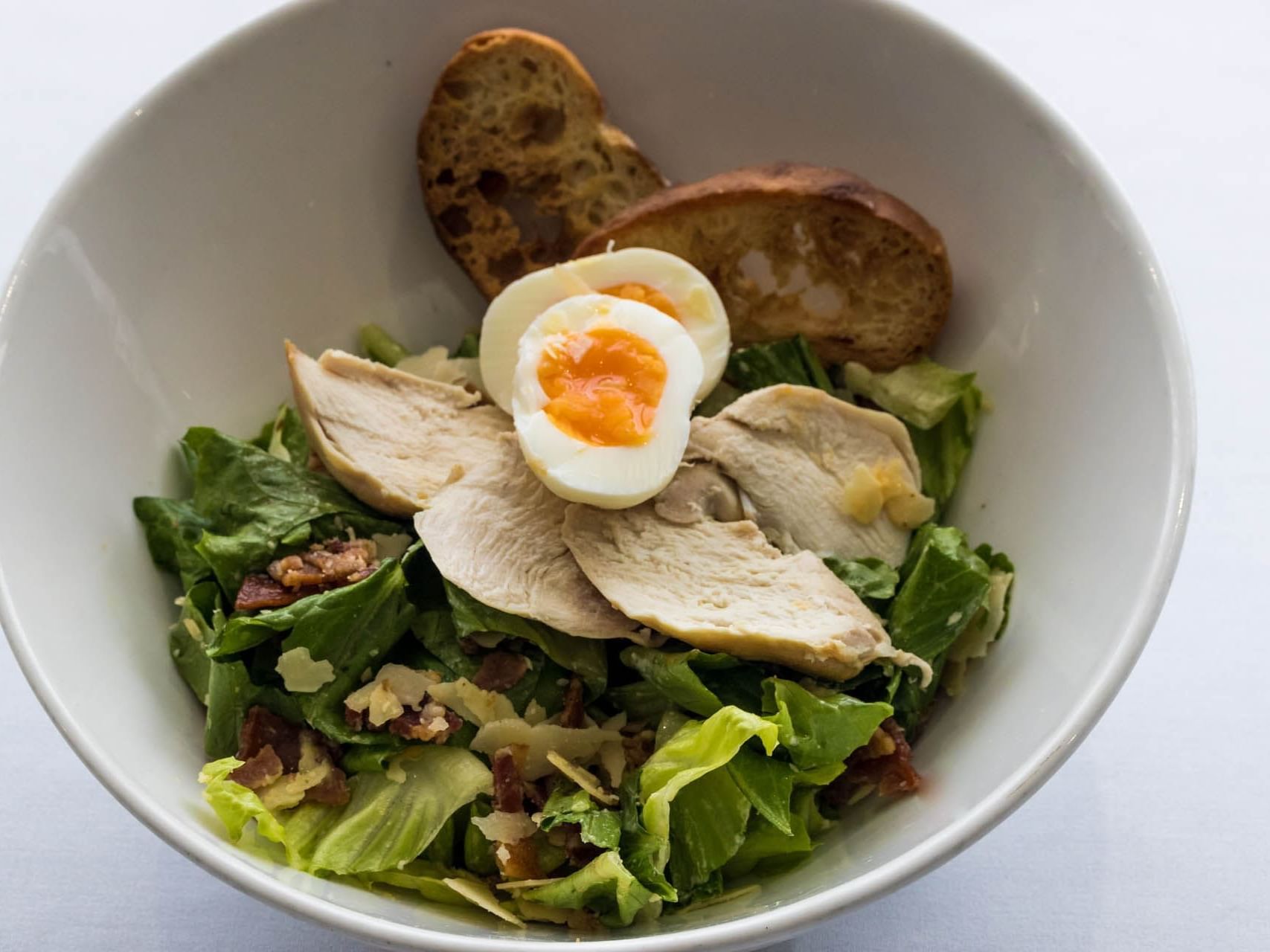 Chicken Caesar salad dish served at Hotel Grand Chancellor Townsville
