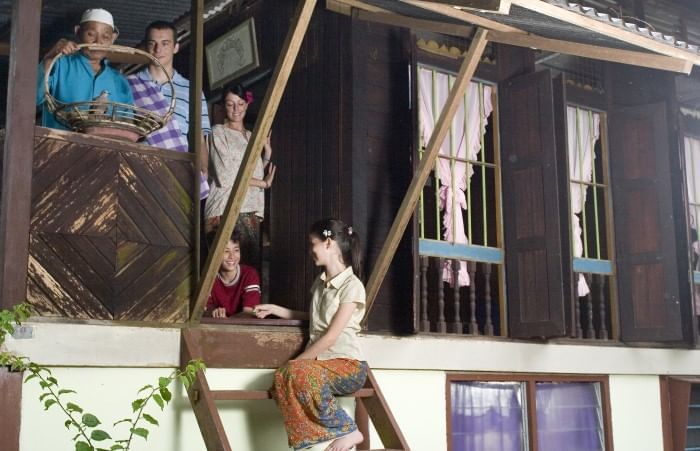 Tourists visiting Malay village house near Sunway Hotel Seberang Jaya