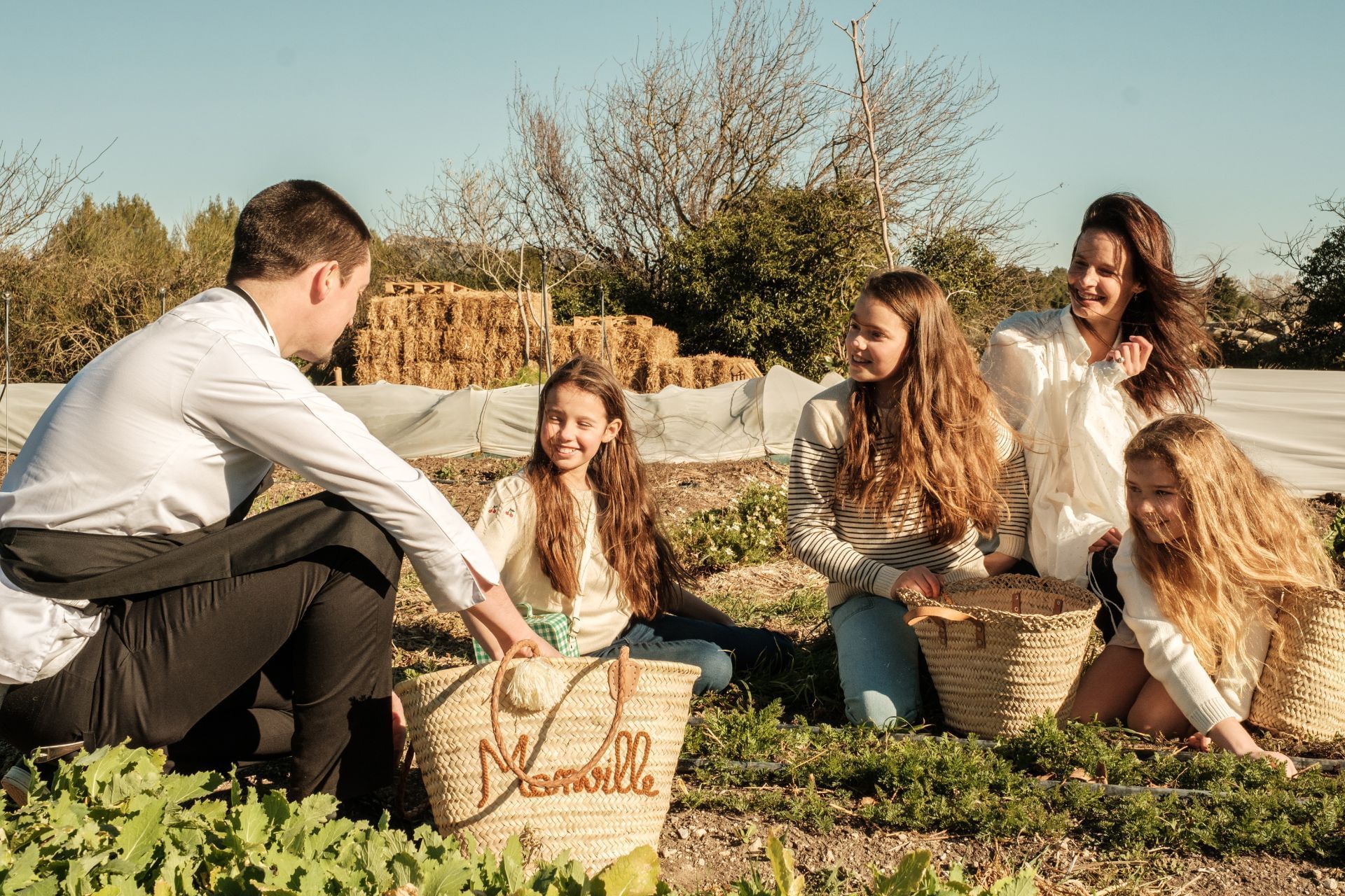 Family setting up for a picnic at Domaine De Manville